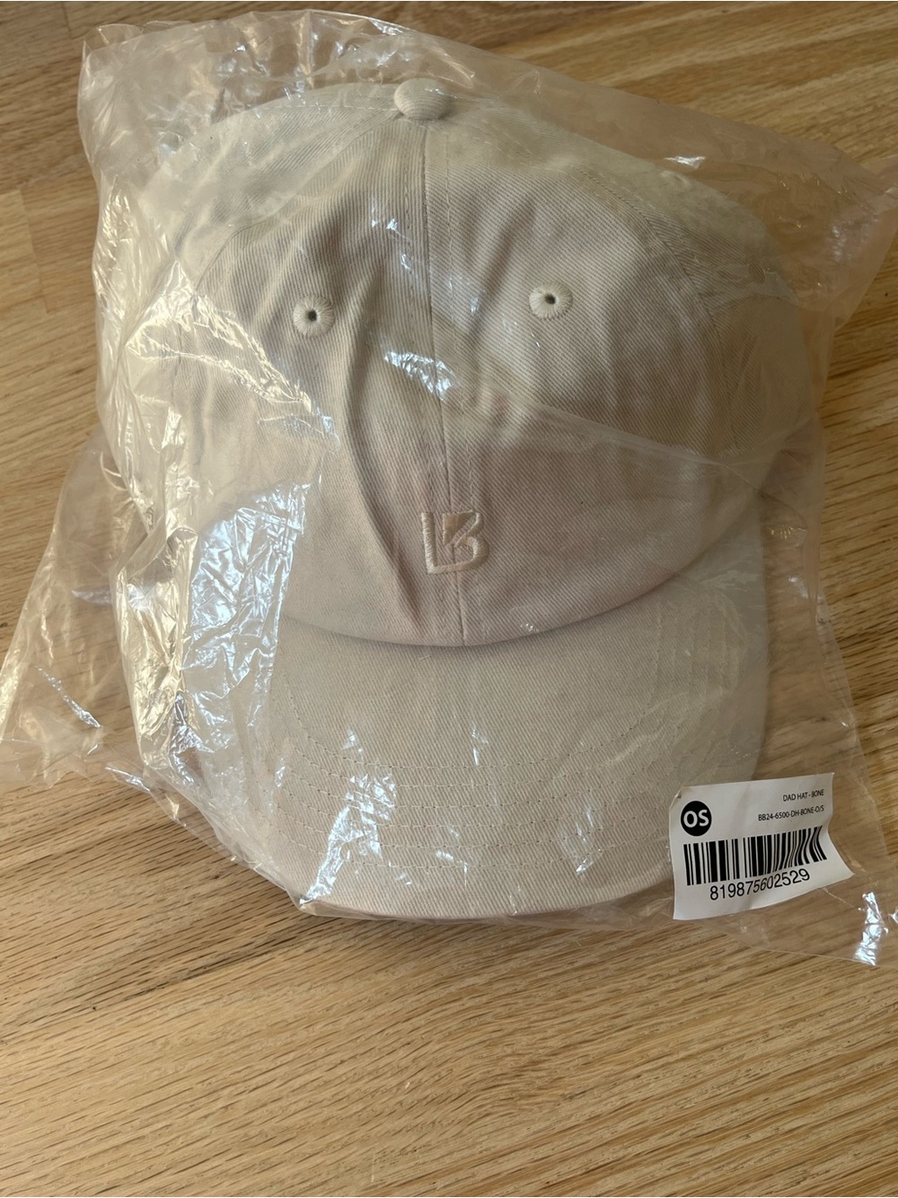 New in bag Buffbunny Collection Dad Hat tan/bone baseball cap